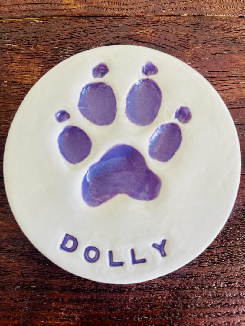 Painted custom ceramic paw print $95